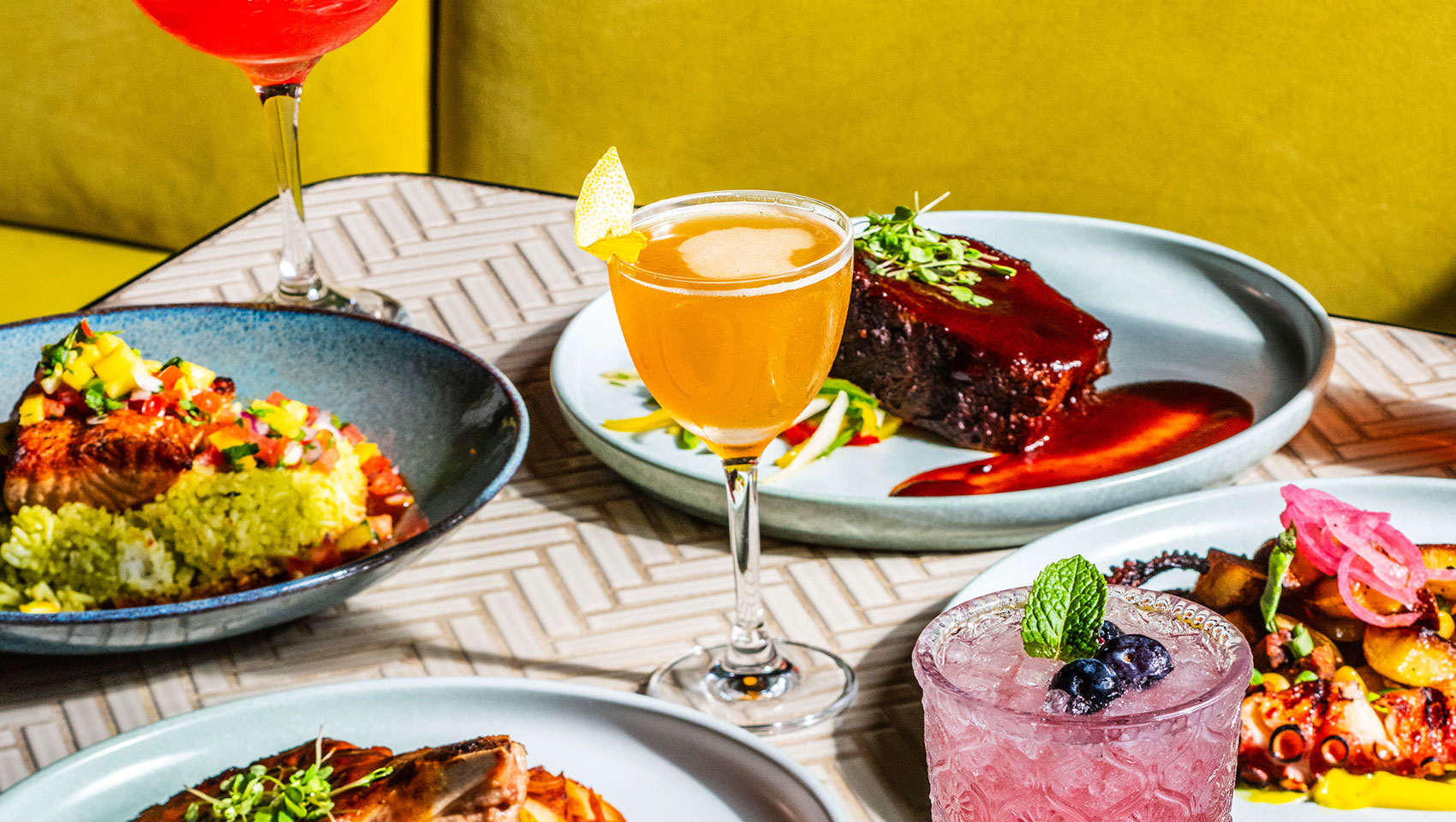 boleo food grouping with yellow couch background