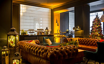 Room with couches and holiday decorations